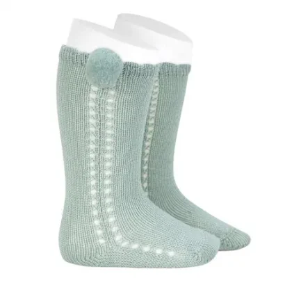 Calcetines altos perlé calado con pompón lateral Buma